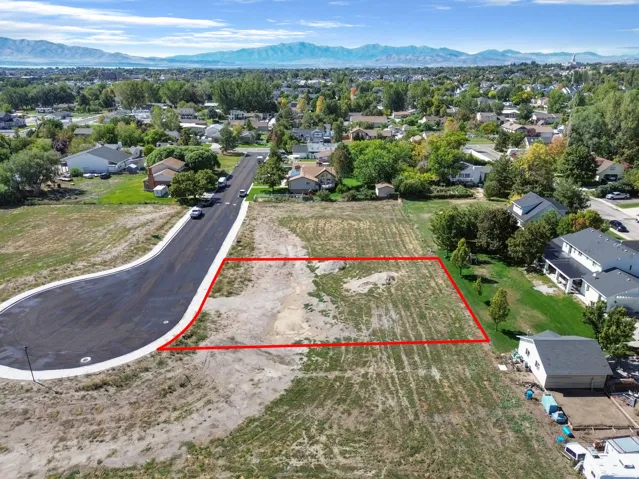 Cleared lot with delineated boundaries and proximity to paved roadway