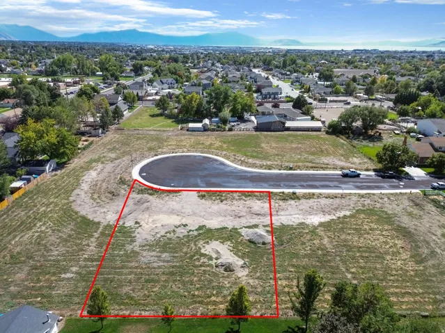 Expansive lot featuring a cul-de-sac and mountain background