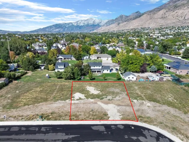 Mountain backdrop, suburban setting, established neighborhood, cul-de-sac frontage, clear lot boundaries