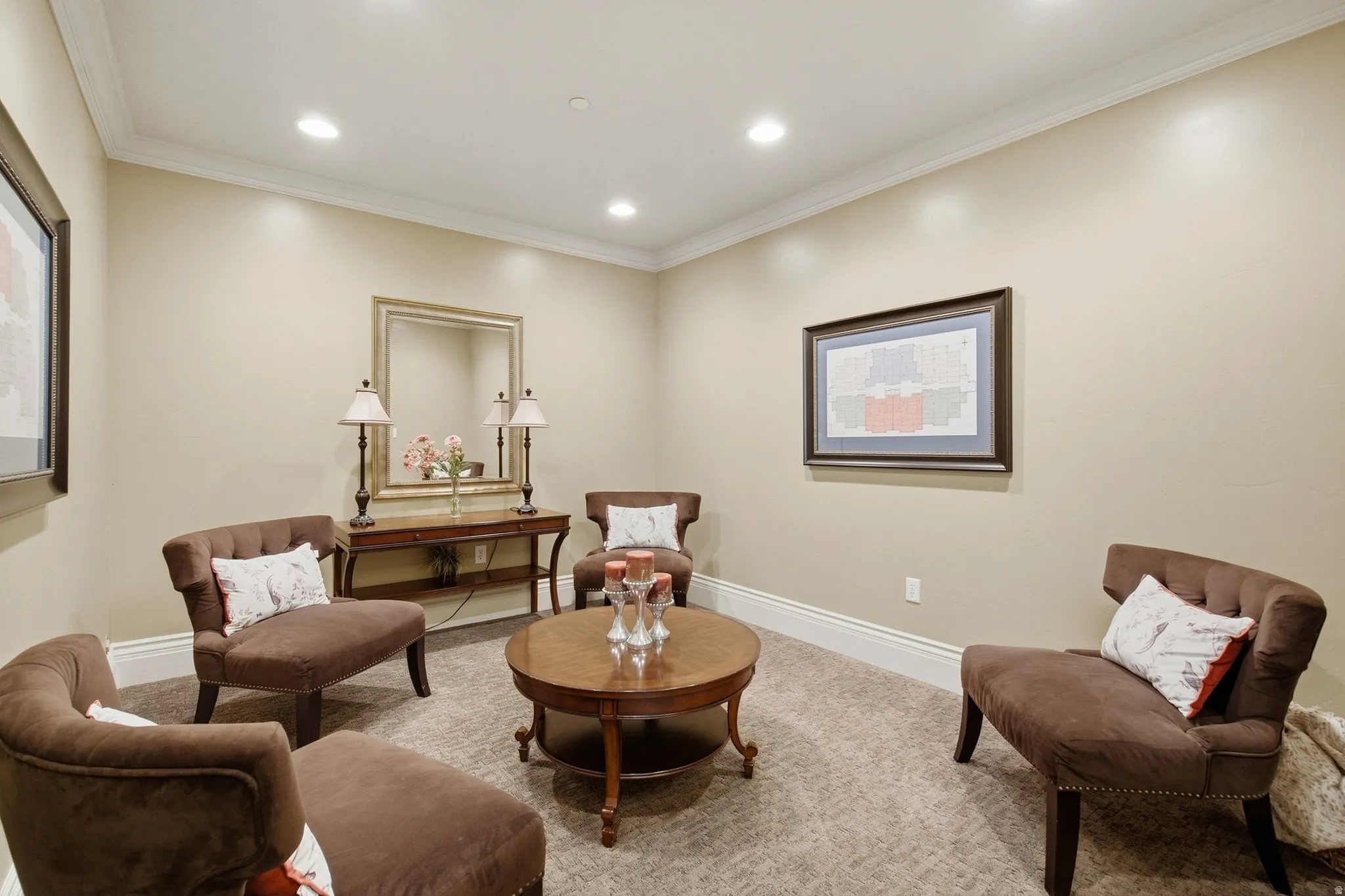 Recessed ceiling lighting, crown molding, light-toned wall finish, and wall-to-wall carpeting