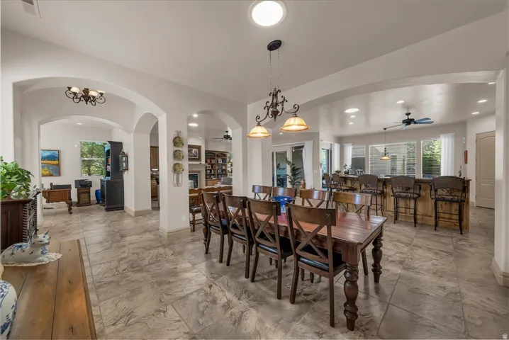 Expansive tiled flooring spans the open-concept design