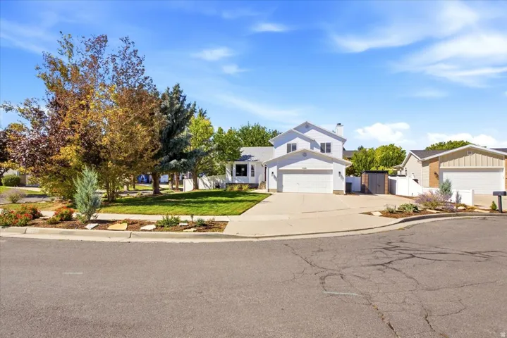 Two-story white exterior with attached garage