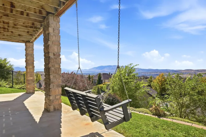 Covered patio with stone-wrapped support columns