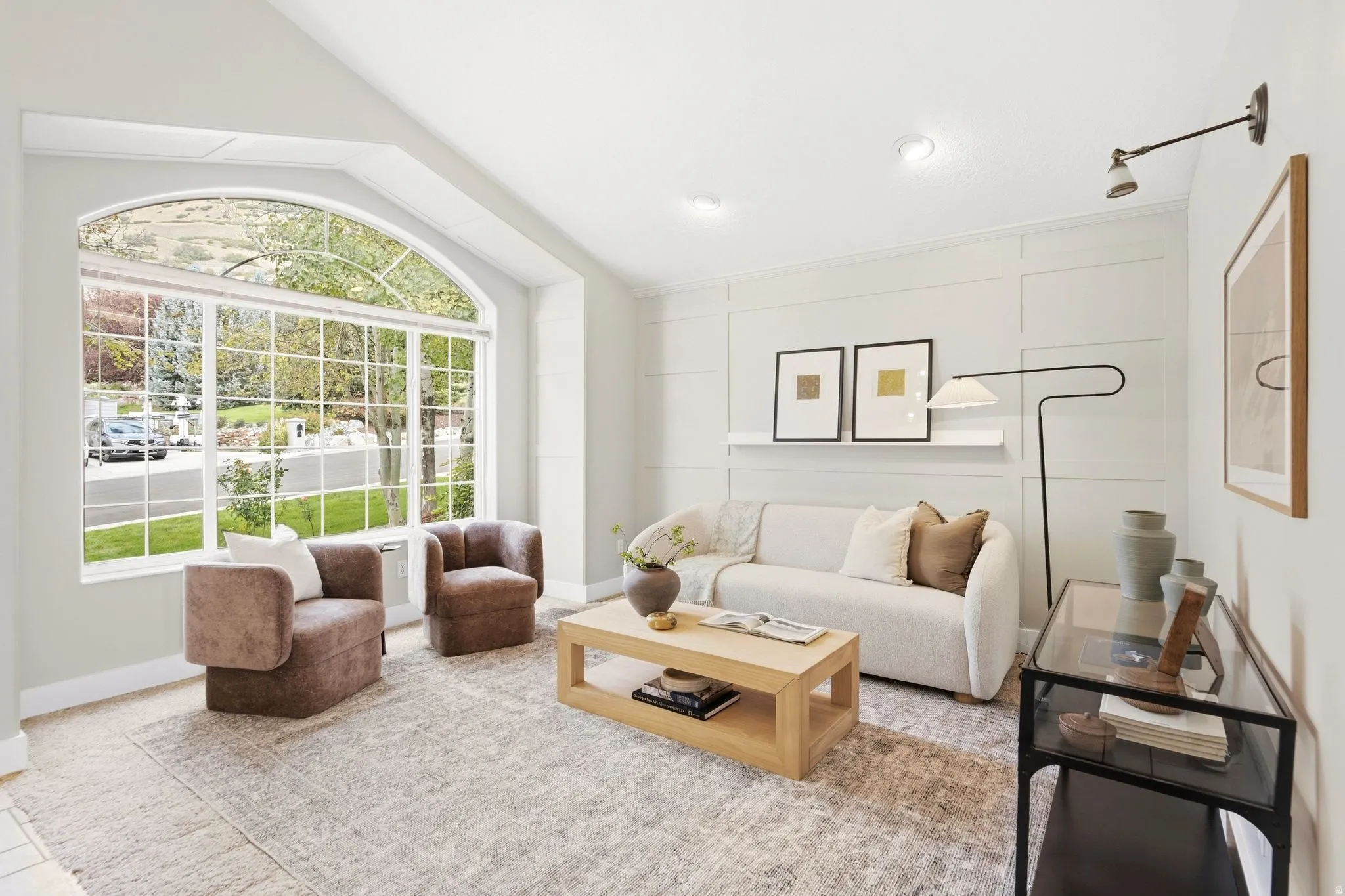 Bright and cozy front entry living room with tons of natural light and gorgeous mountain views.