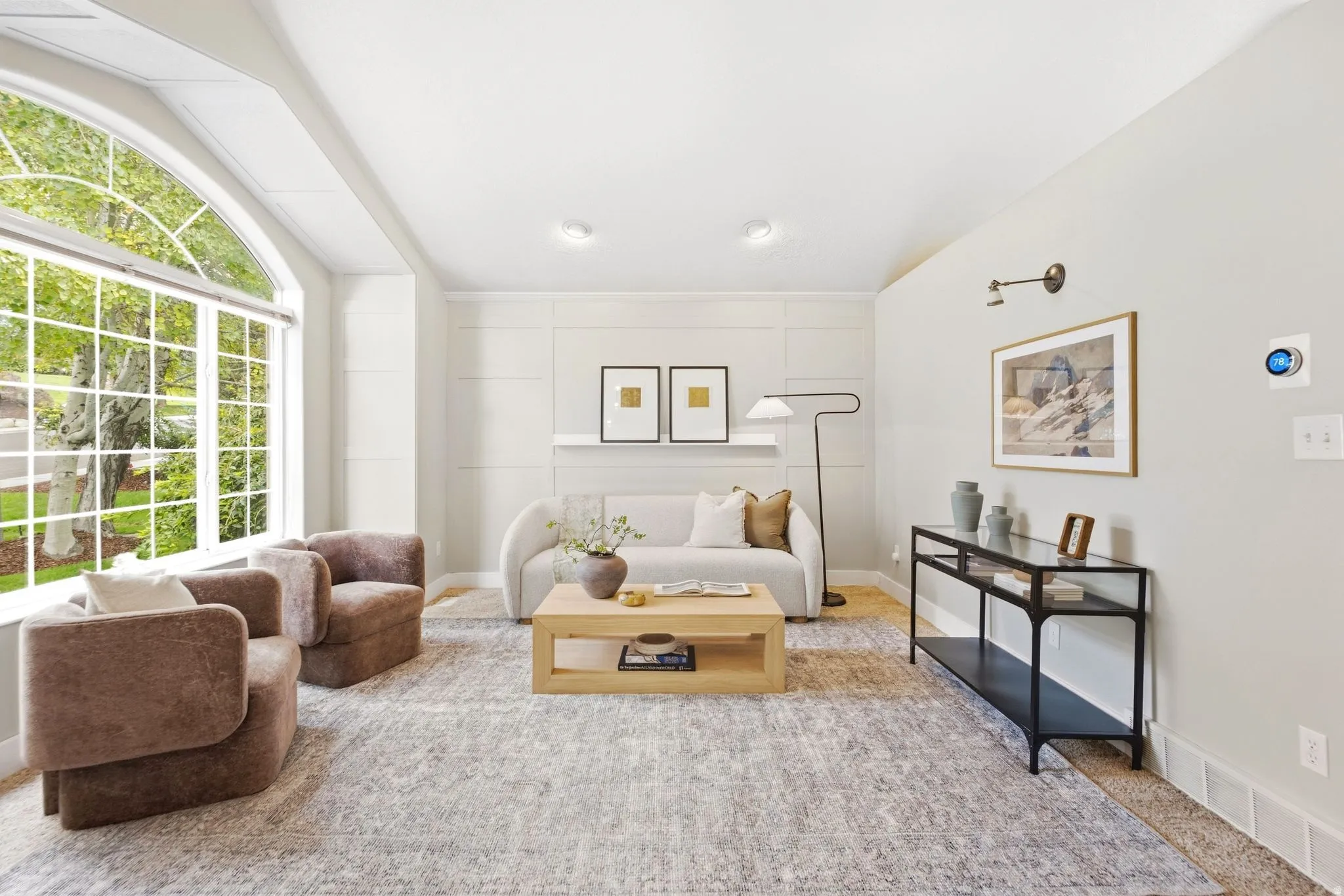 Bright and cozy front entry living room with tons of natural light and gorgeous mountain views.