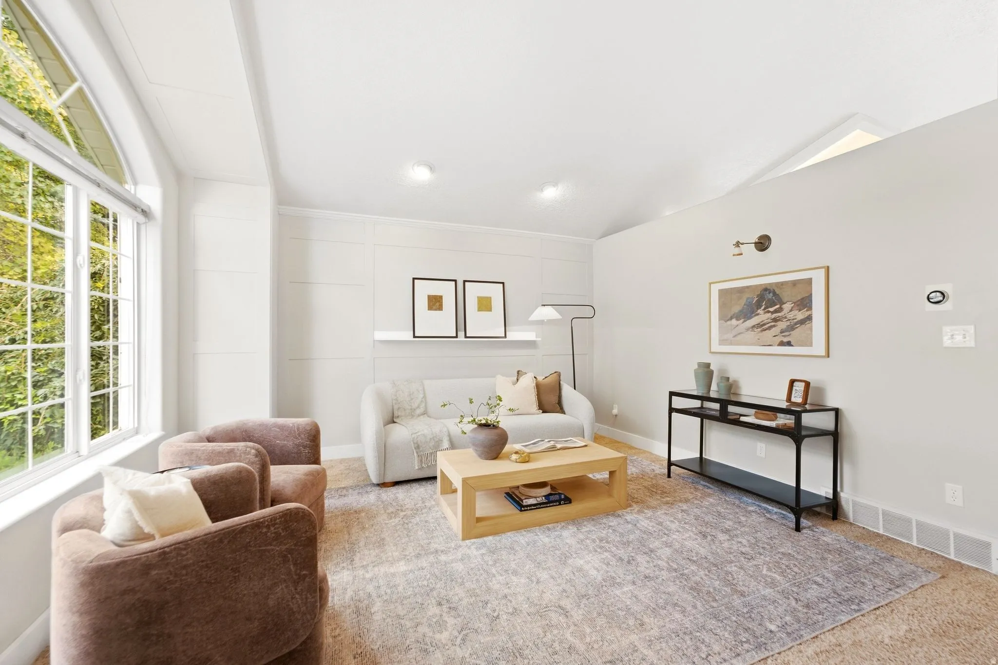 Bright and cozy front entry living room with tons of natural light and gorgeous mountain views.
