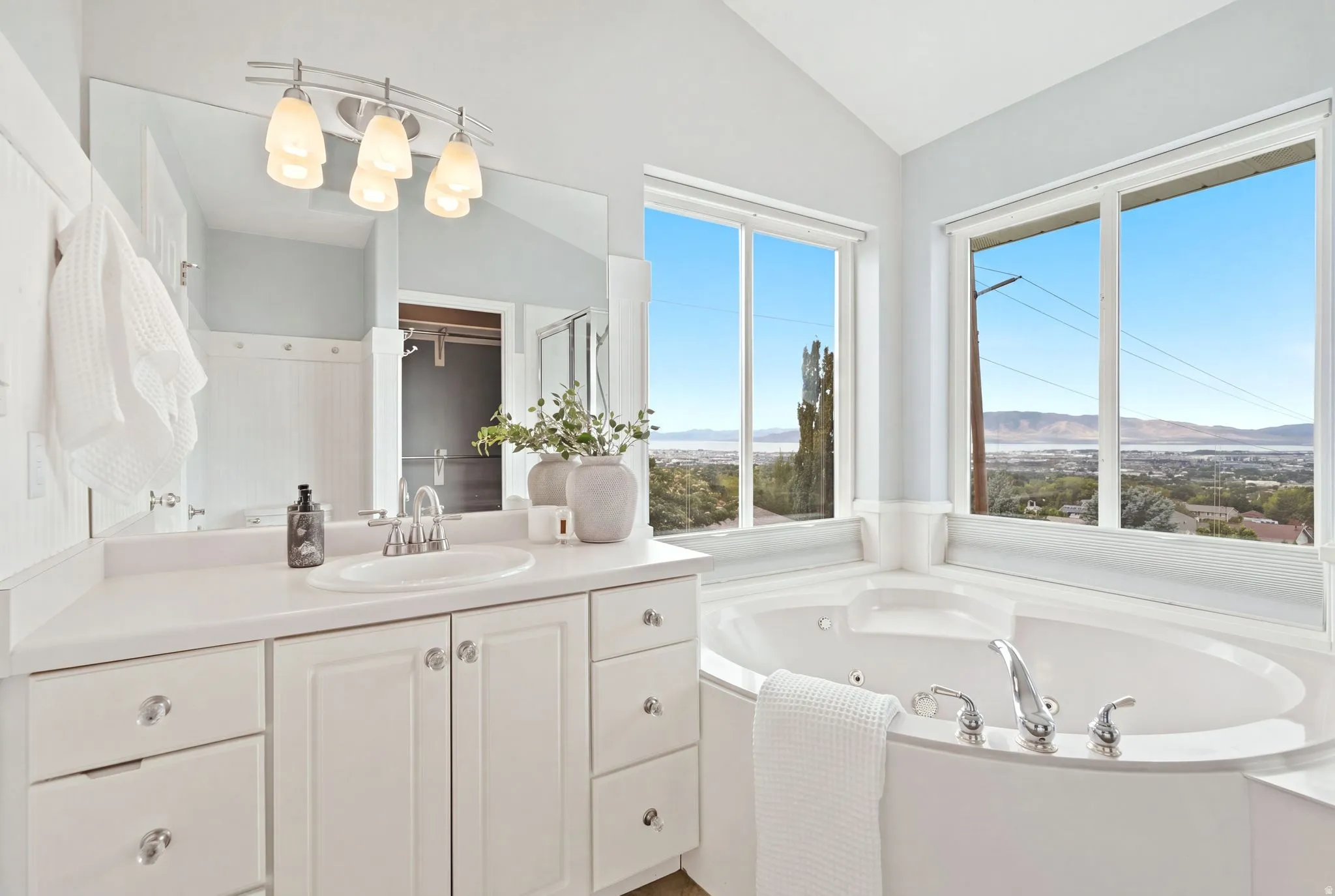 Built-in corner soaking tub with unbeatable valley, lake, and mountain views.