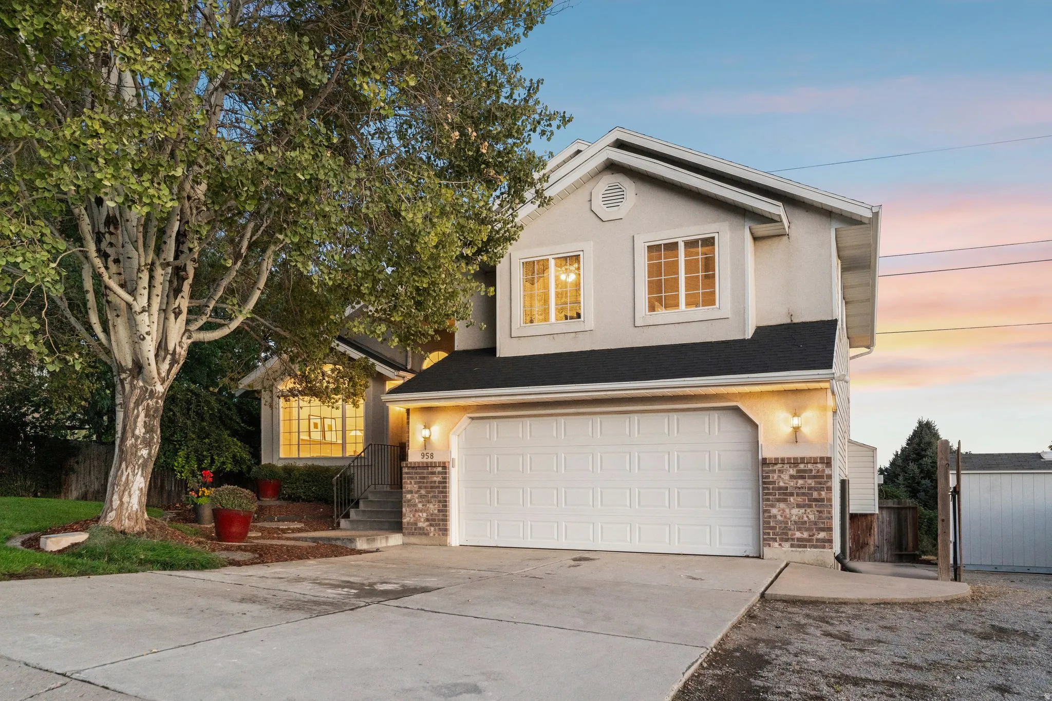 Front view of the home at twilight