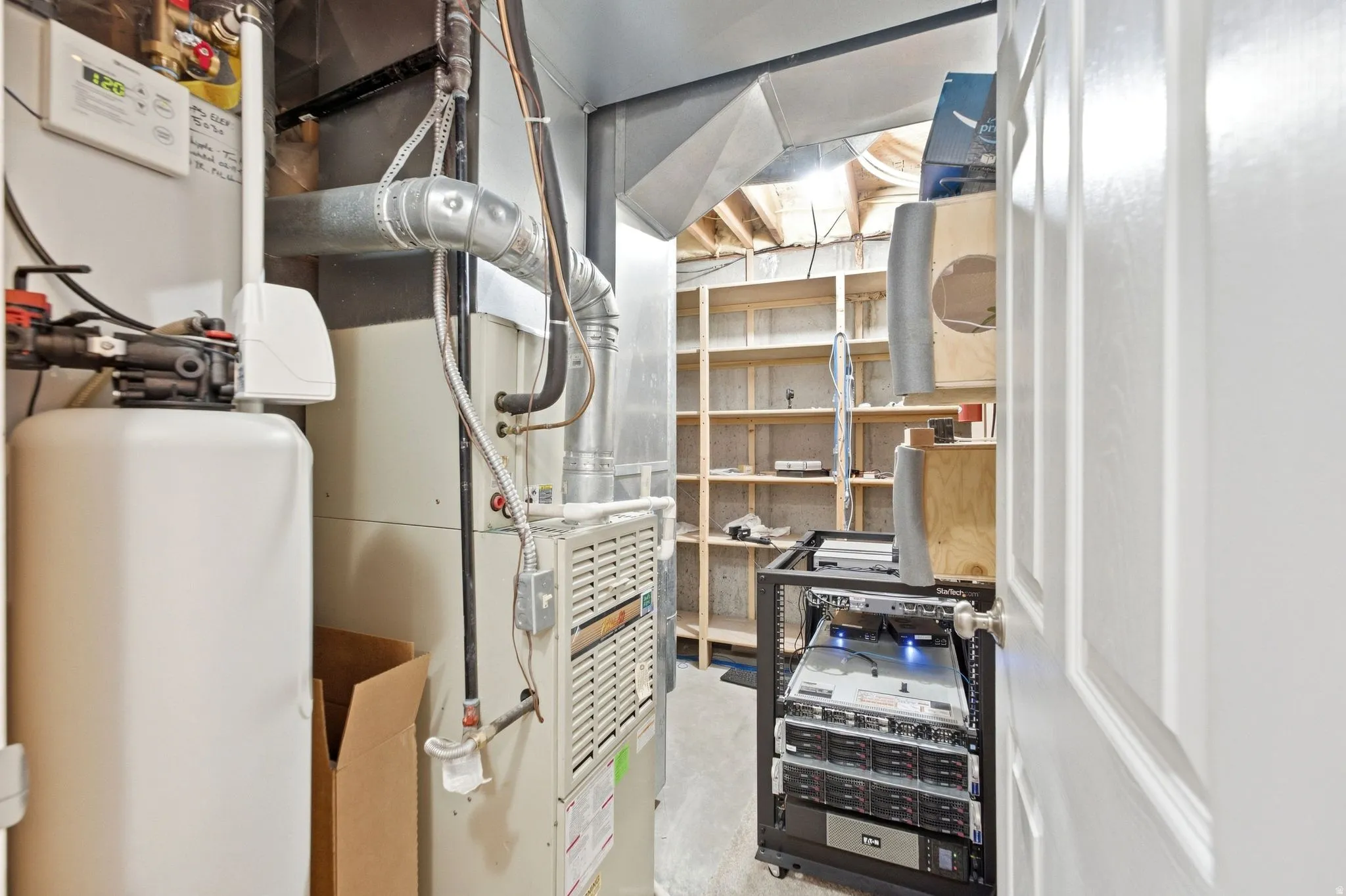 View of utility room and additional storage
