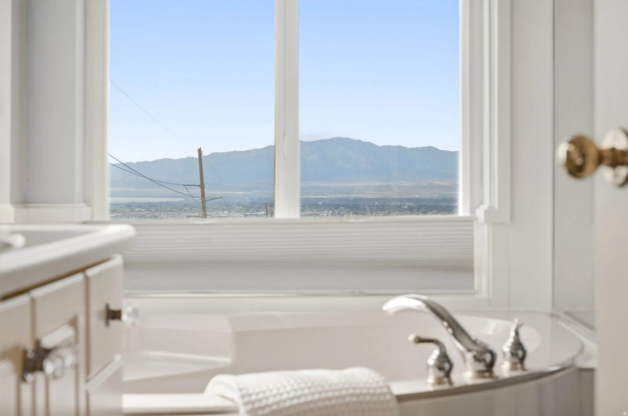 Expansive lake and mountain views.