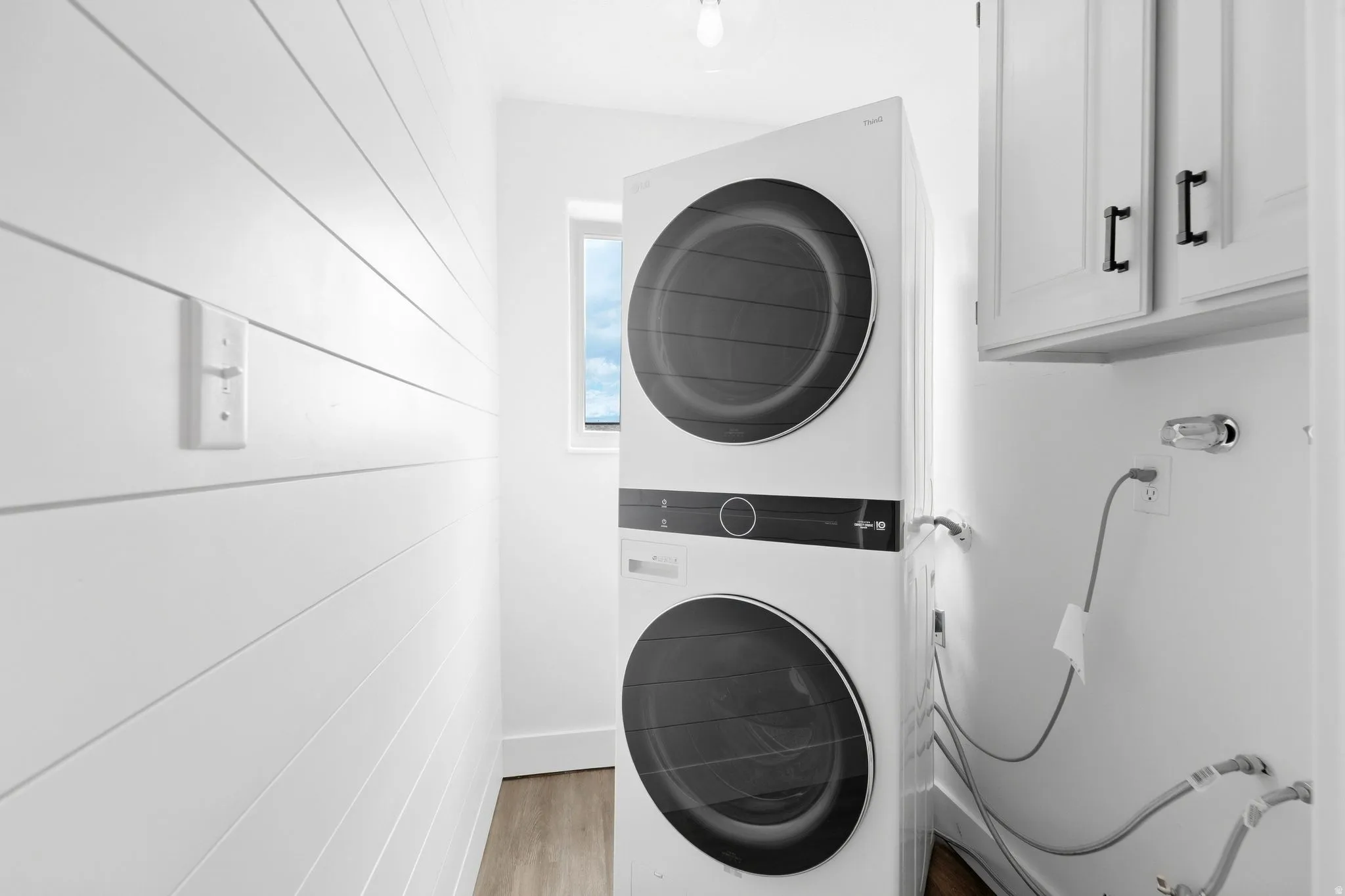 Laundry room right off of the half bathroom