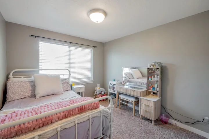 Wall-to-wall carpeting and neutral wall paint