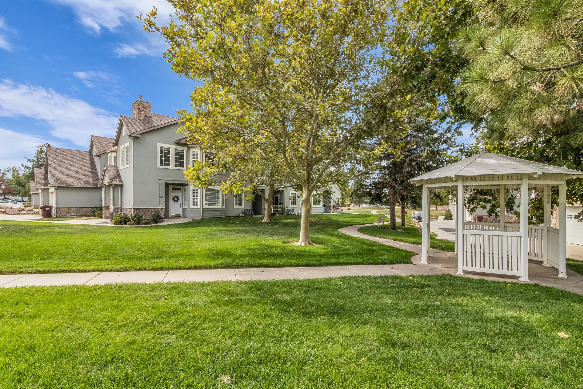 Beautifully maintained grounds with gazebo.