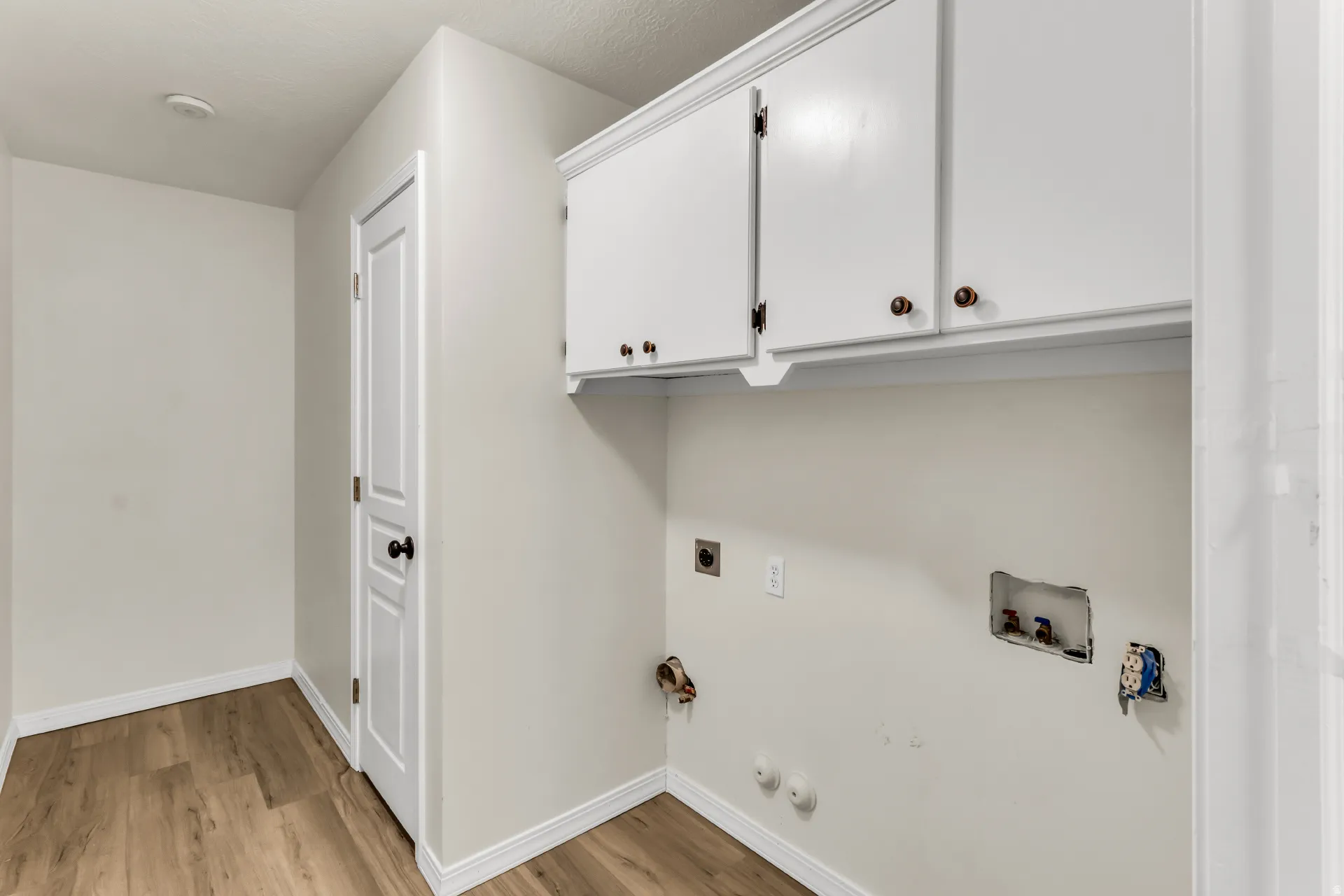 Laundry Room, featuring both gas and electric dryer options.