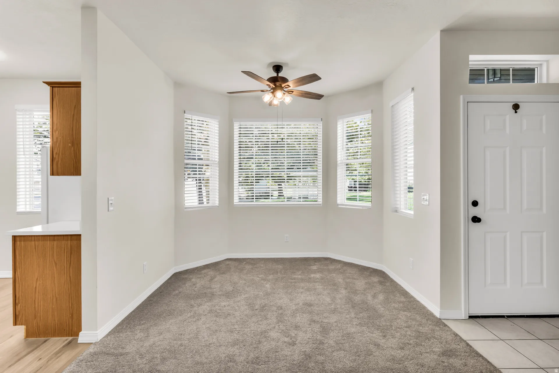 Dining area with beautiful bay windows offering lovely views.