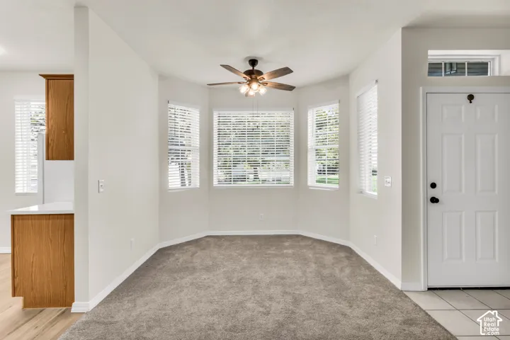 Dining area with beautiful bay windows offering lovely views.