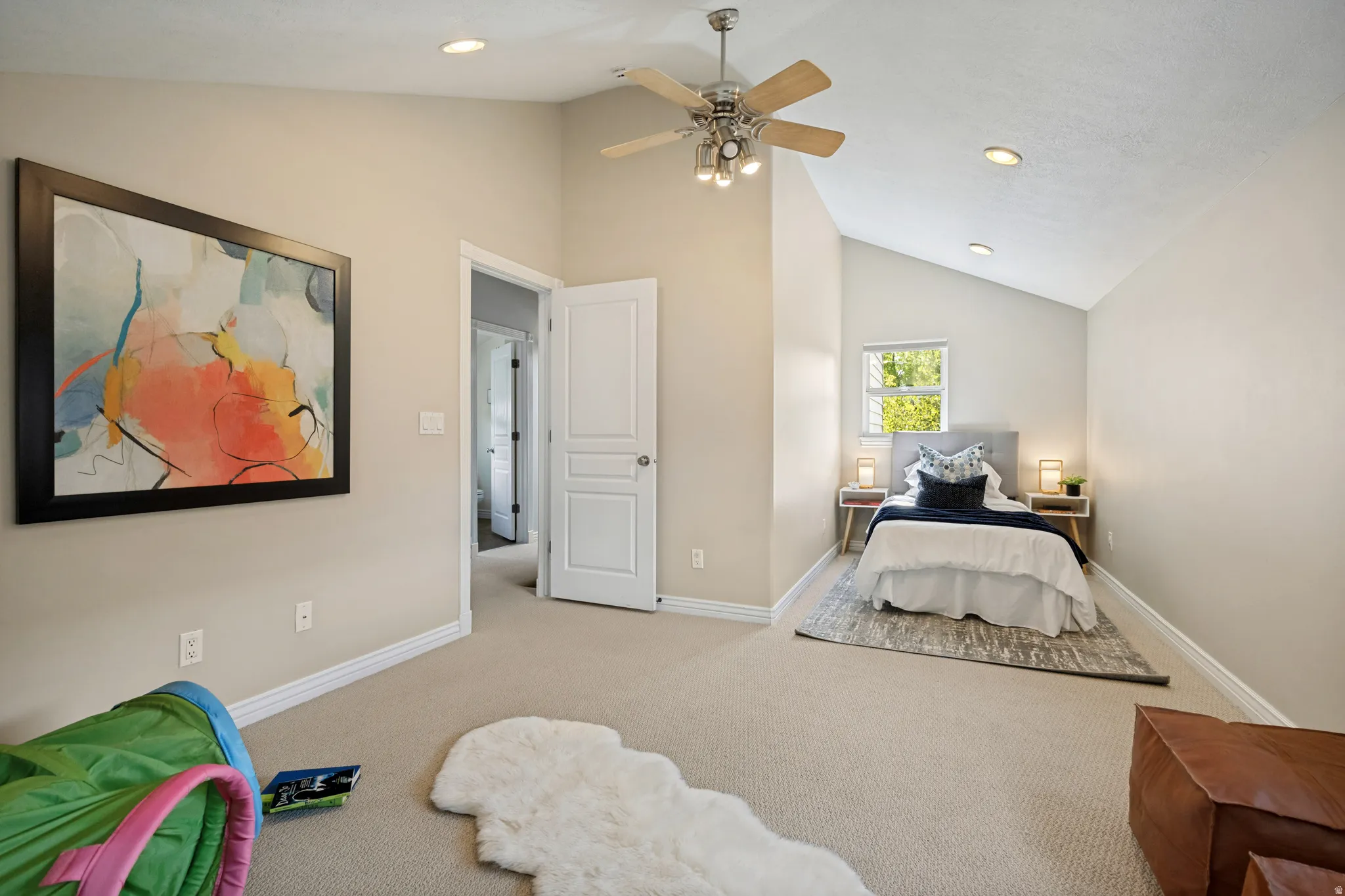 Second bedroom up, vaulted ceilings with recessed lighting, ceiling fan, and carpeted flooring