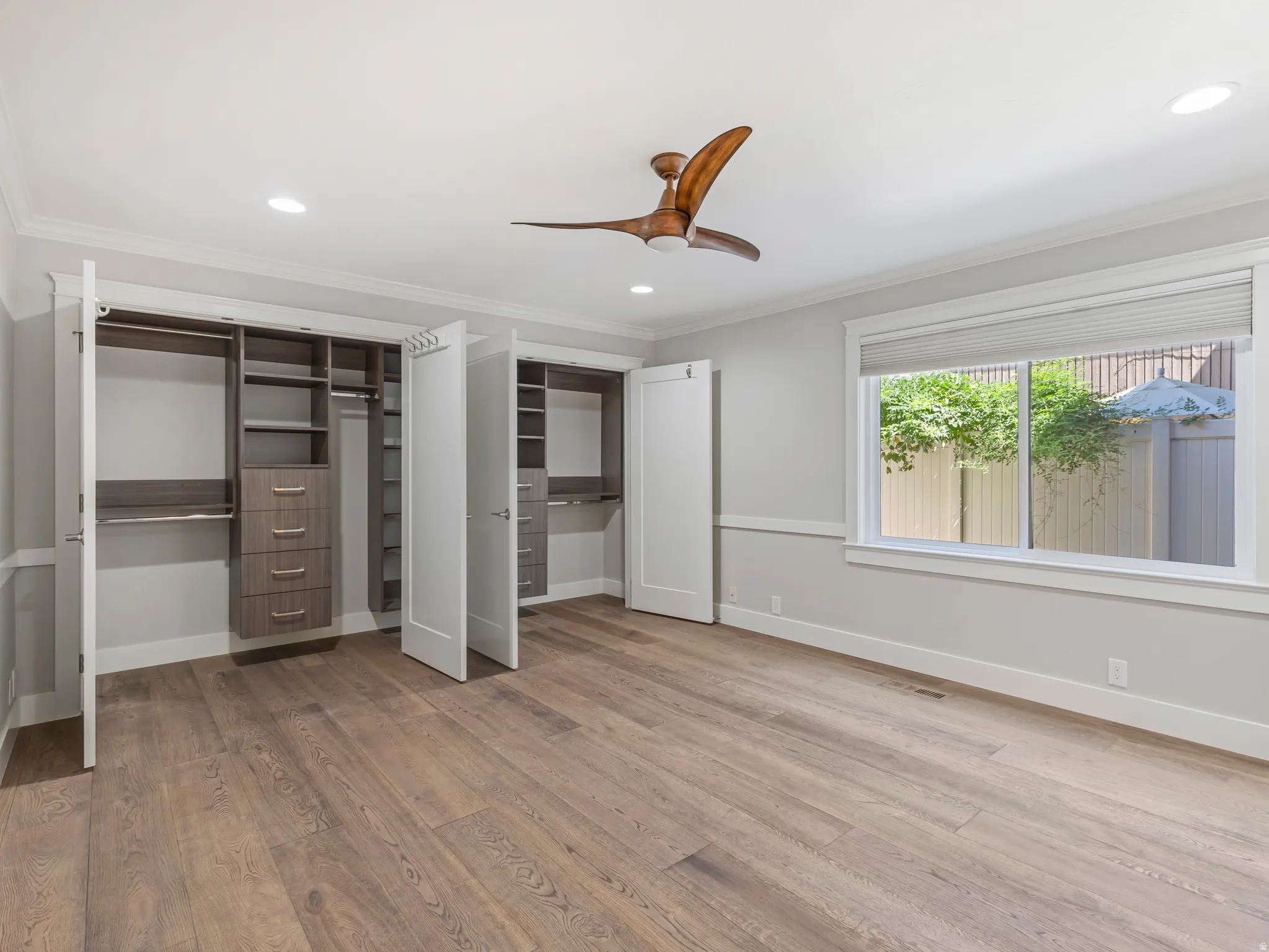 MAIN FLOOR Primary Bdrm Closets have a professional organizer system so you'll have room for everything