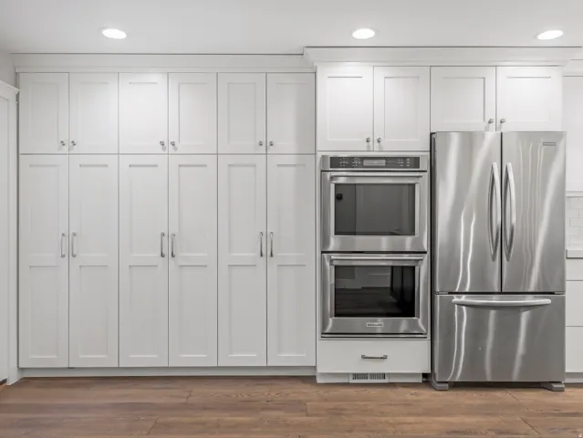 Your Microwave is tucked out of sight in one of these marvelous storage closets where it doesn't clutter the Countertop