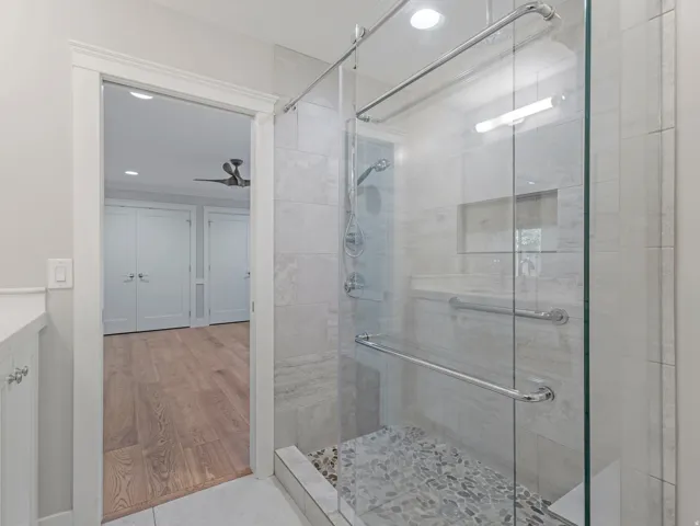 ...including a roomy pebble-floored beautifully appointed shower.