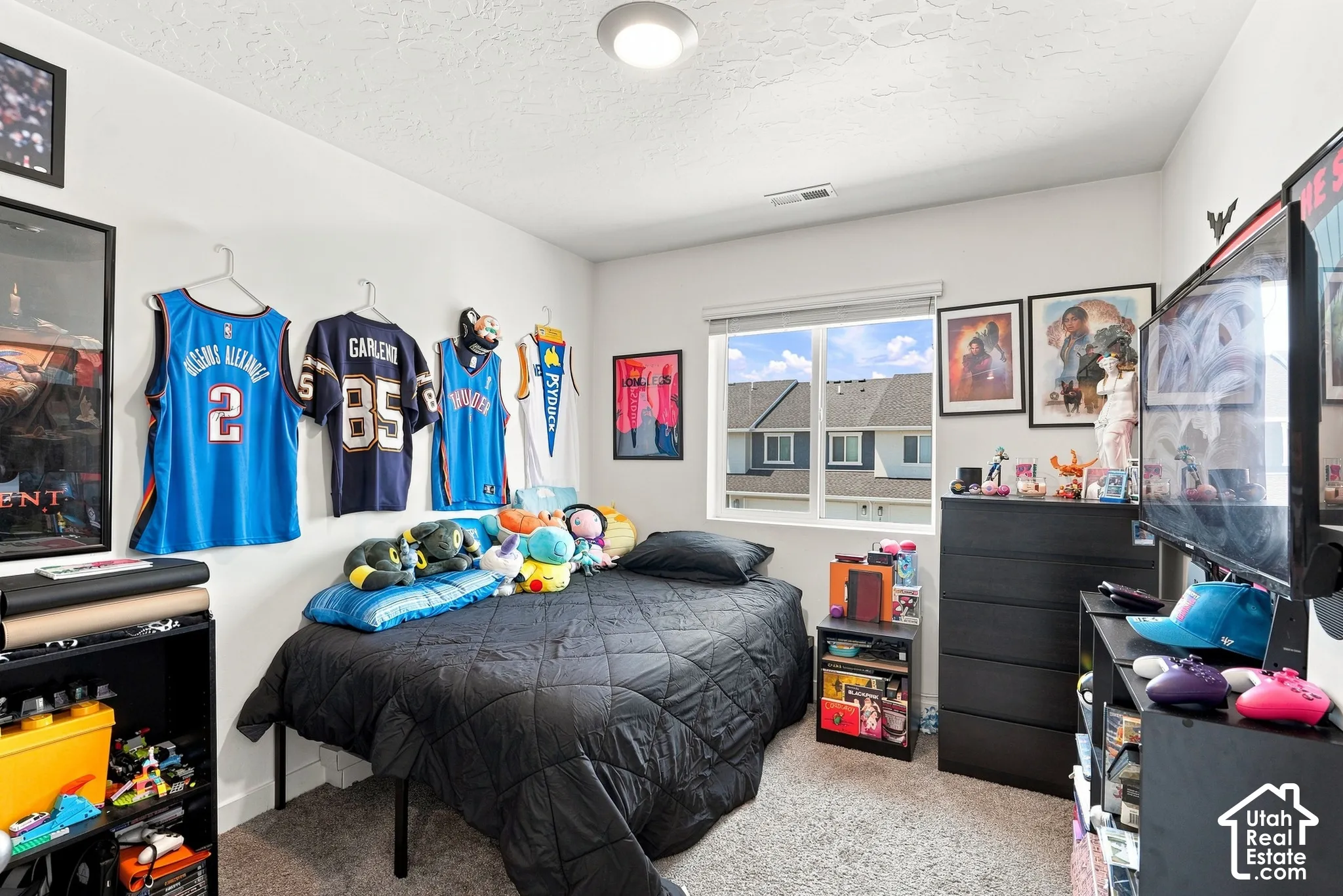 Recessed lighting, window with blinds, and neutral wall paint