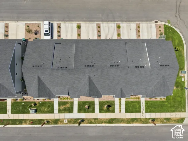 Pitched shingle roofline with multiple gables