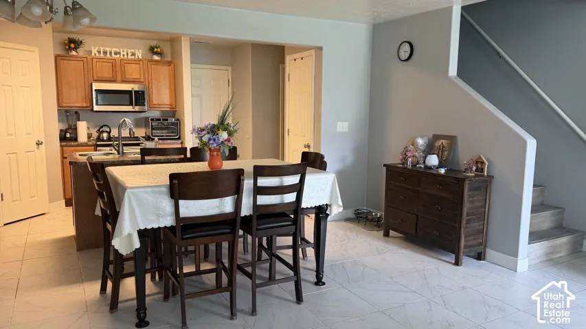 Kitchen featuring wood cabinetry and stainless steel appliances