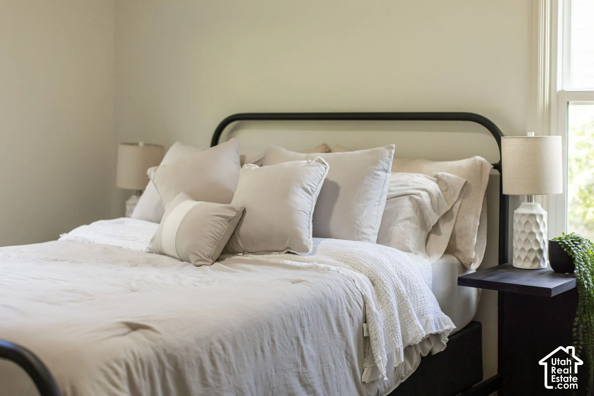 Black metal bed frame with a minimalist design