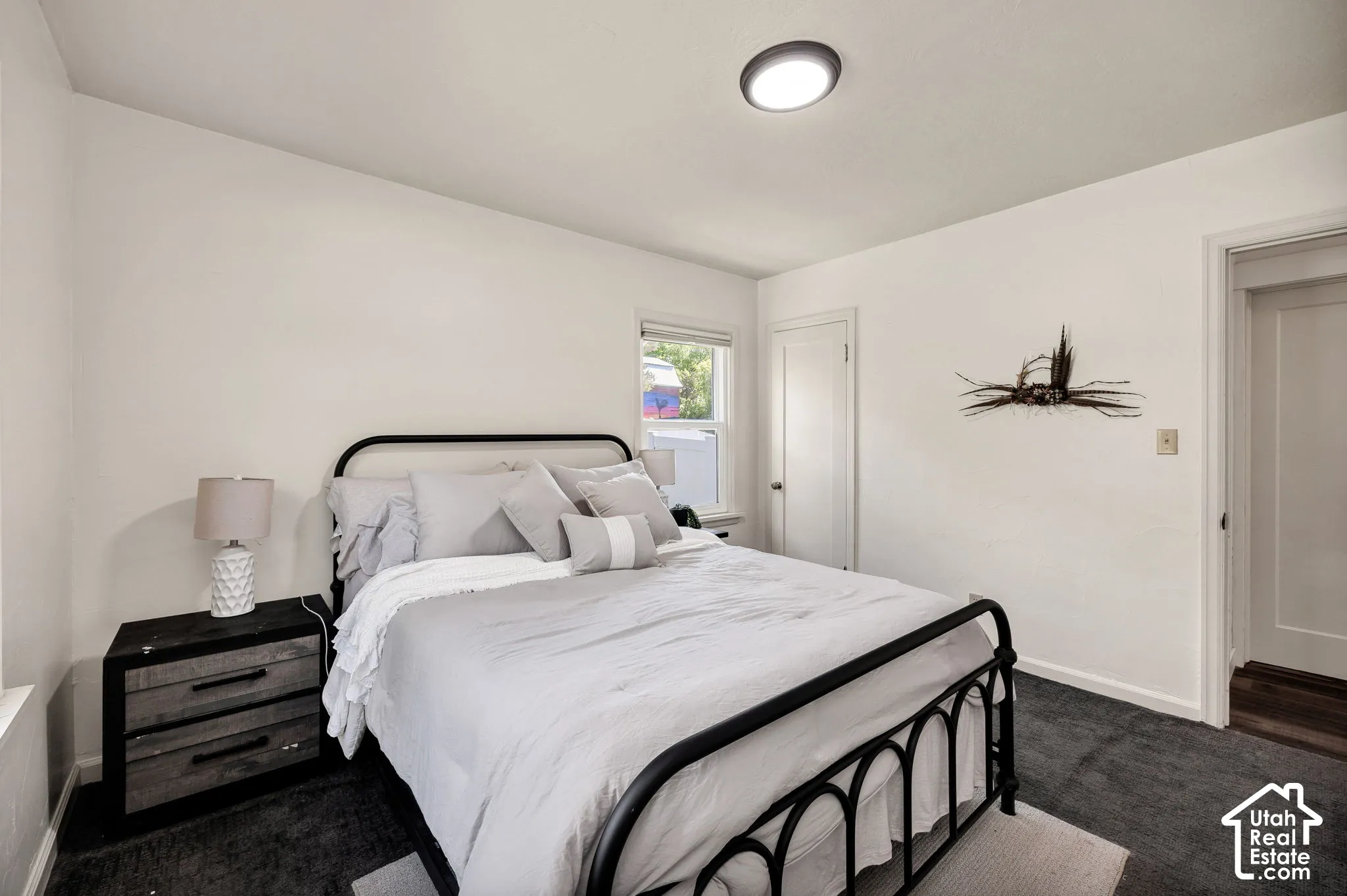 Recessed window with natural light and a flush-mount ceiling fixture