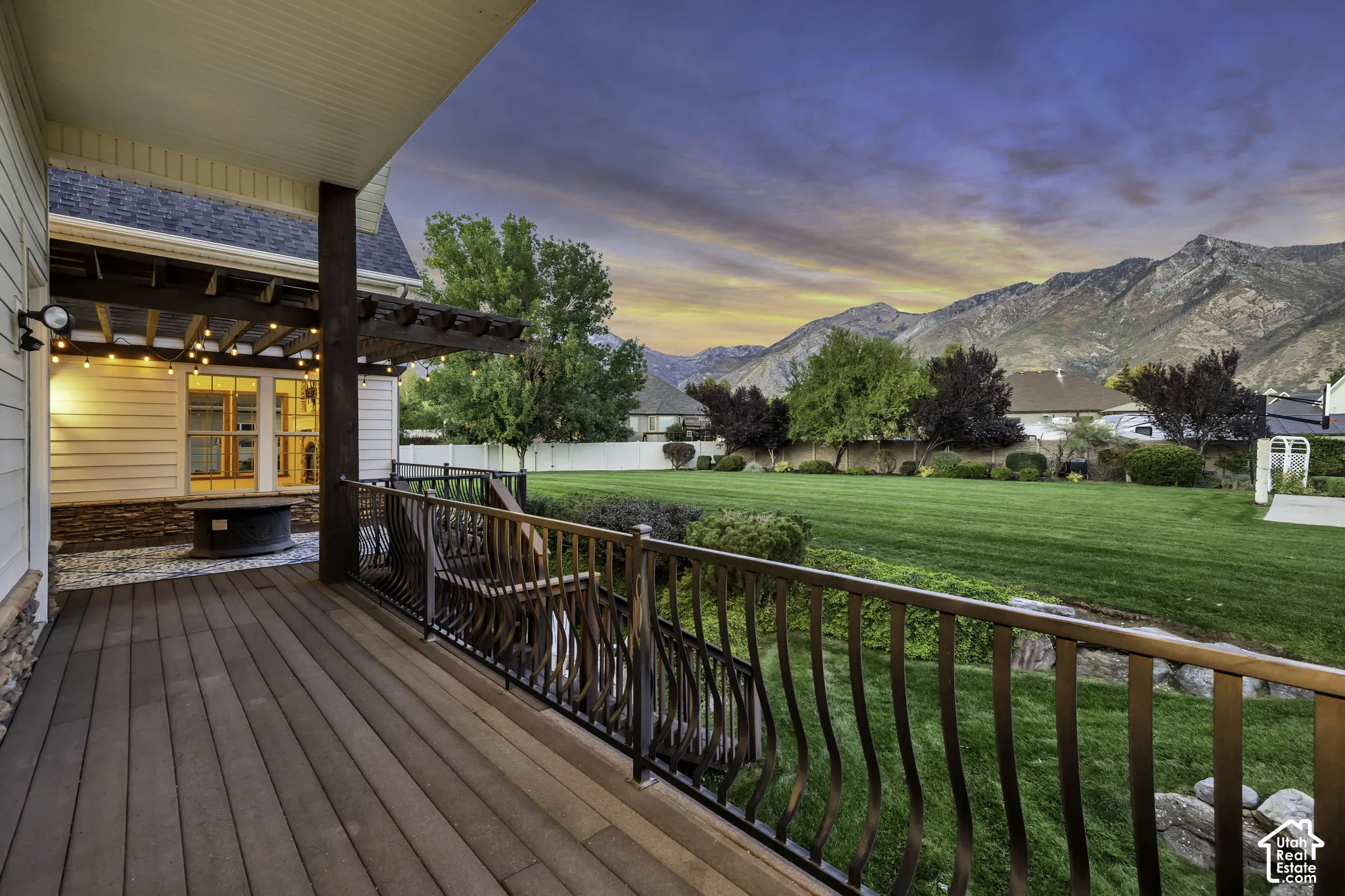 Expansive deck with composite decking and decorative metal railing