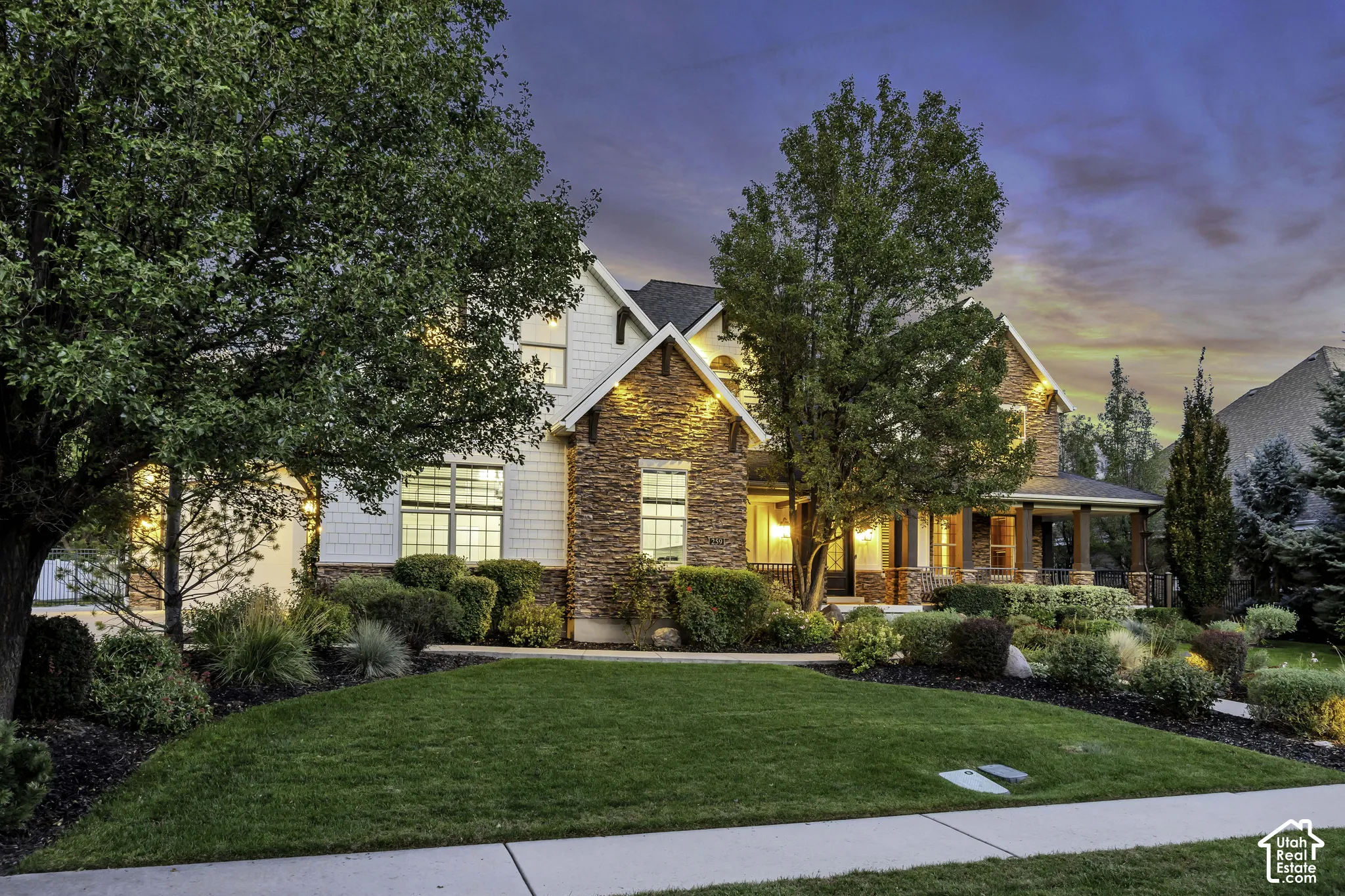 Stone and shingle exterior with gabled roof lines