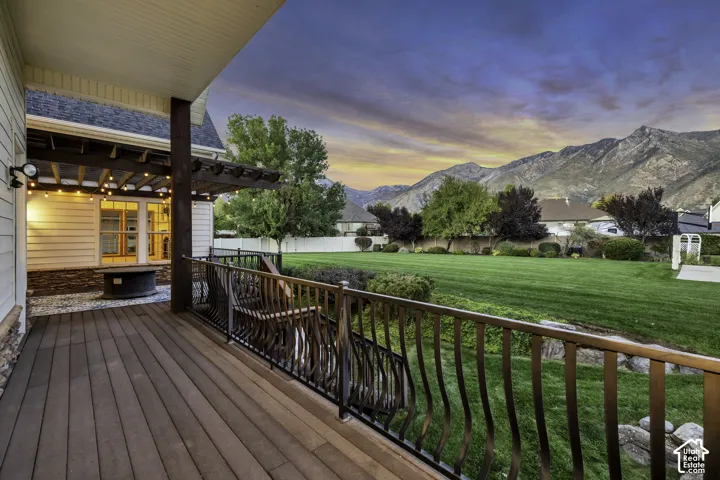 Expansive deck with composite decking and decorative metal railing