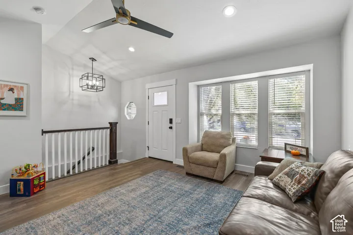 Vaulted ceilings with recessed lighting and a contemporary ceiling fan