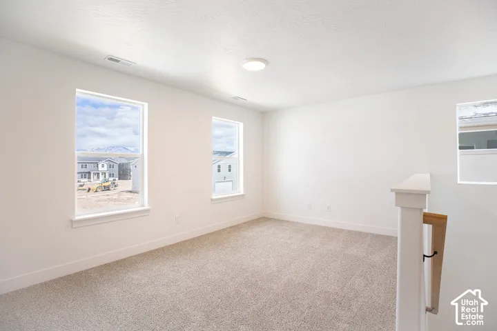 Loft area on second floor with two large windows