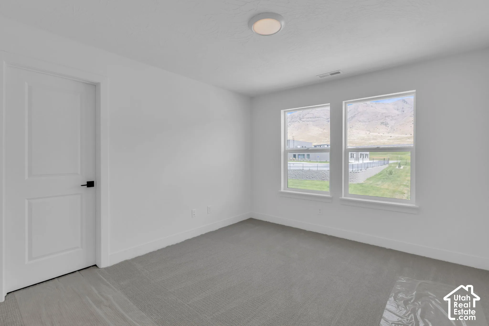 Large oversized secondary bedroom with spectacular mountain views.