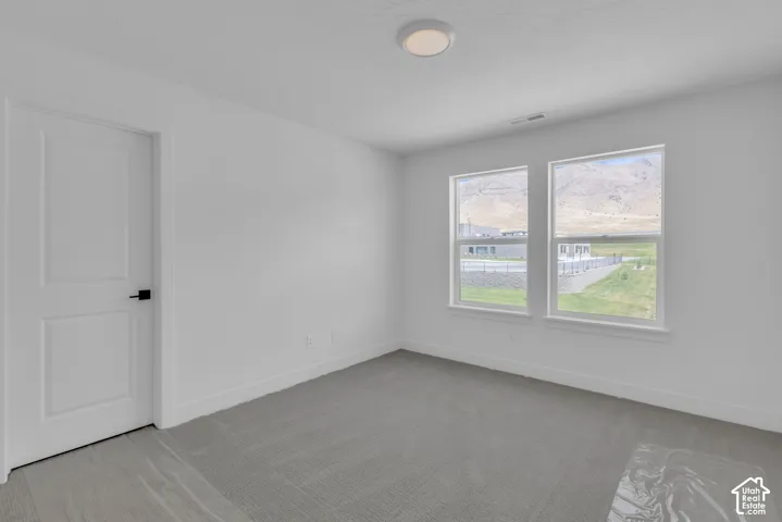 Large oversized secondary bedroom with spectacular mountain views.