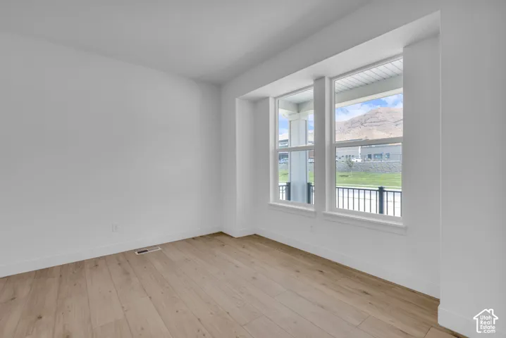 Office or flex space off the entry with oversized windows and mountain views.