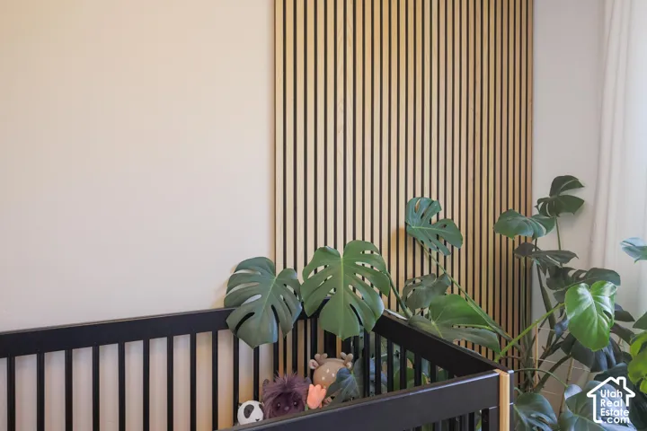 Wood-slat accent wall with a neutral wall color
