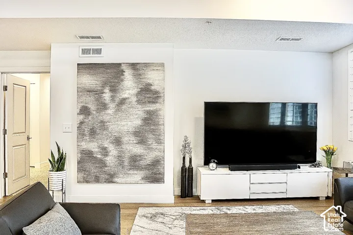 Wood-finish flooring with white walls