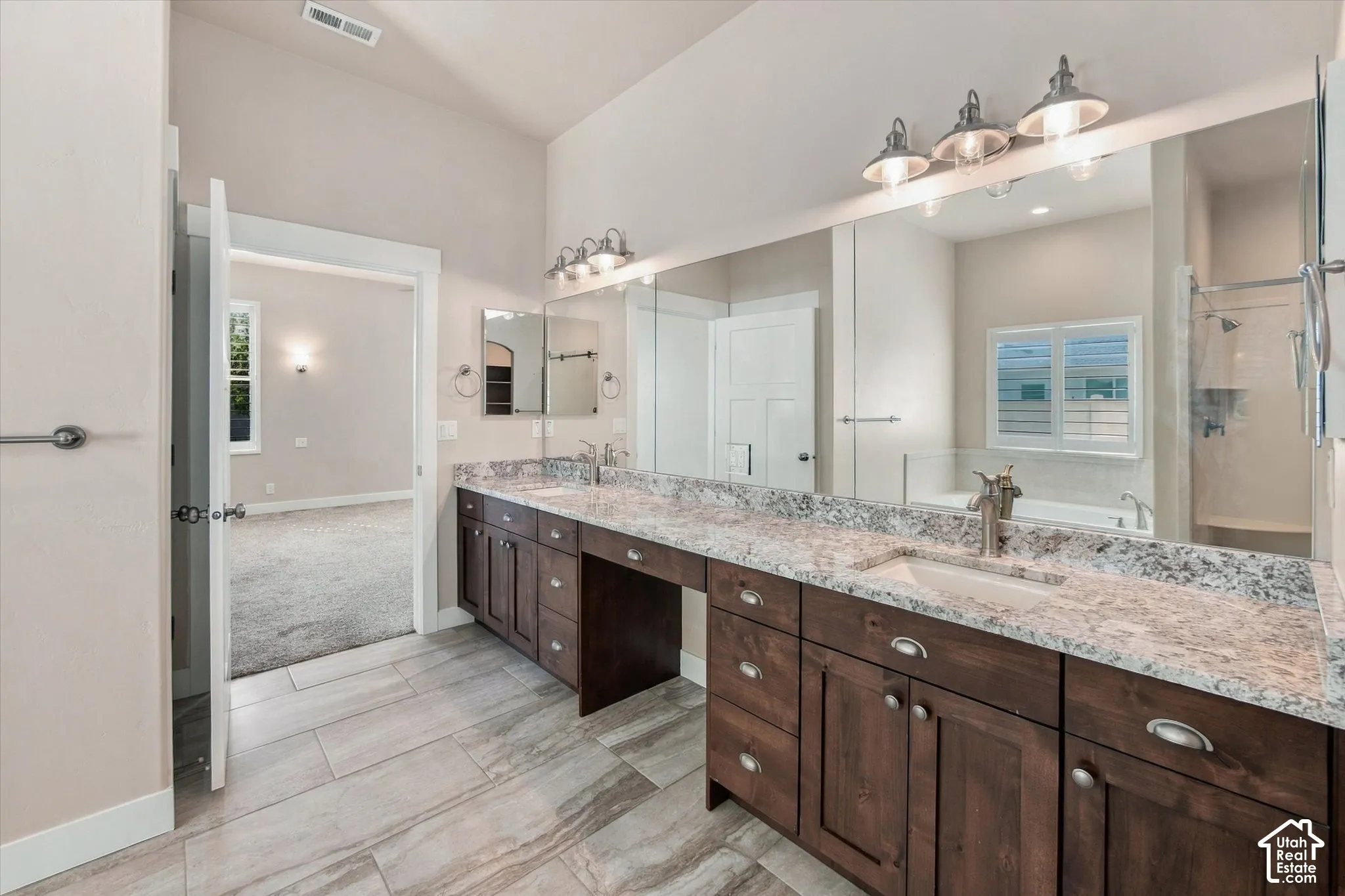 Master Ensuite with Double vanity with granite-countertop.