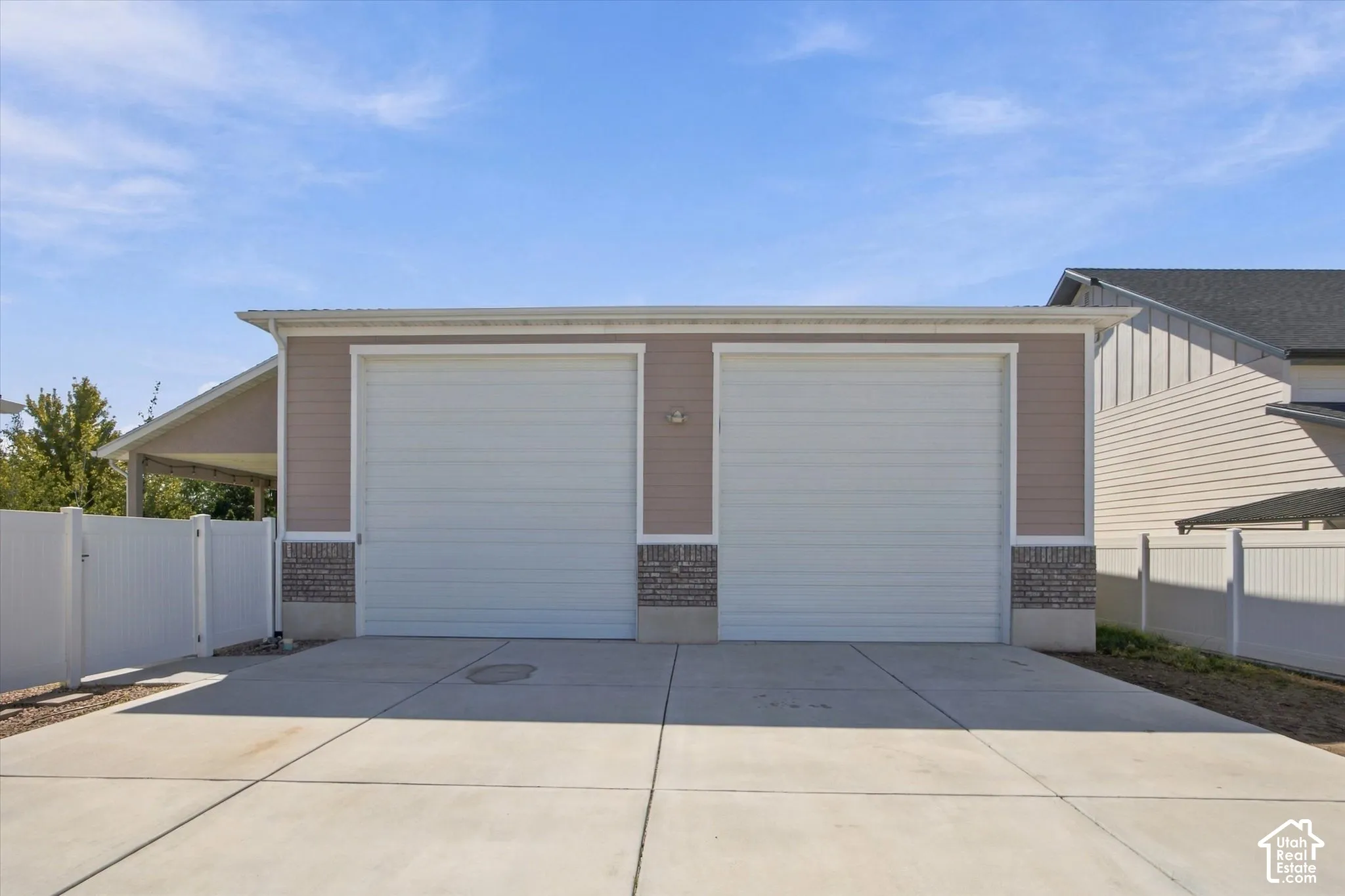 Detached 8 car garage with two 14' x 14'  doors