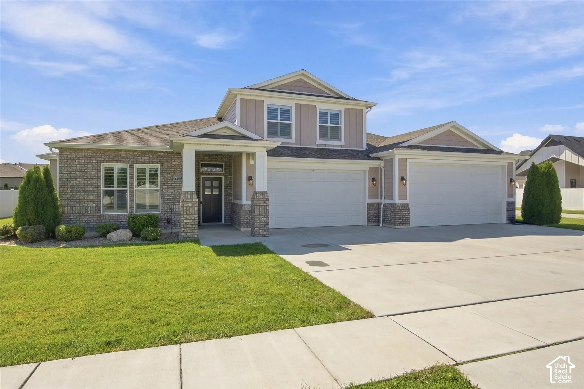 Brick Rambler w/ attached 4 car garage