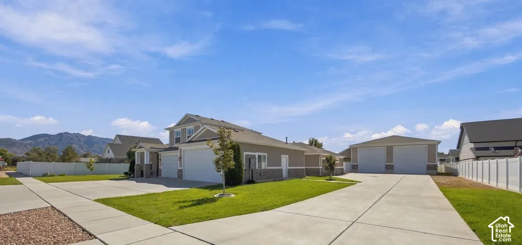 Side of home and Detached 8 car garage!  Plenty of parking!