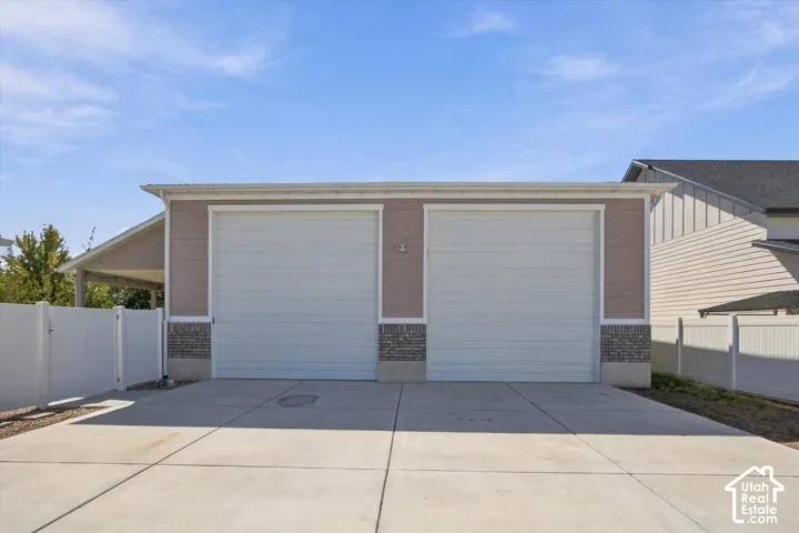 Detached 8 car garage with two 14' x 14'  doors