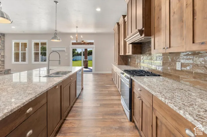 Kitchen, Dining and entrance to back deck and backyard.