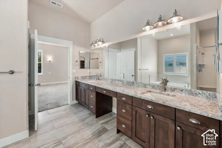 Master Ensuite with Double vanity with granite-countertop.