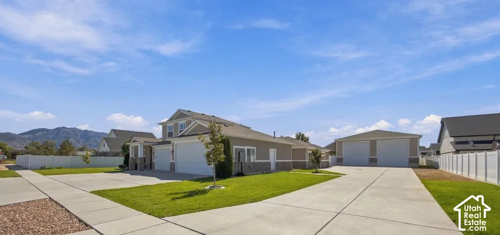 Side of home and Detached 8 car garage!  Plenty of parking!