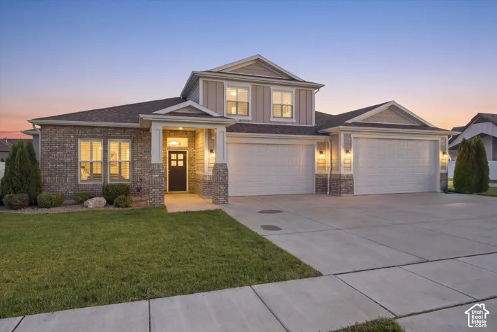 Brick Rambler w/ attached 4 car garage