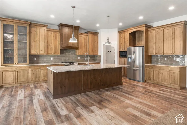 Spacious kitchen with Custom Cabinetry and Granite Countertops.
