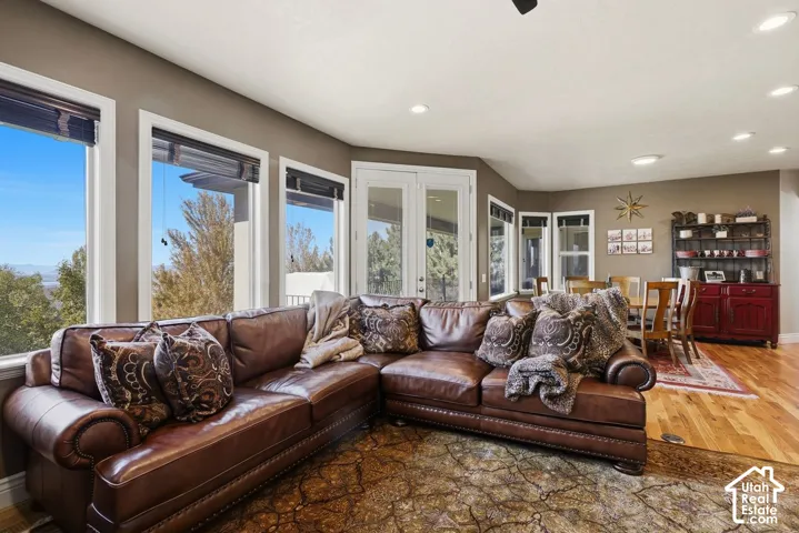Beautiful great room with hardwood floors and access to the covered deck